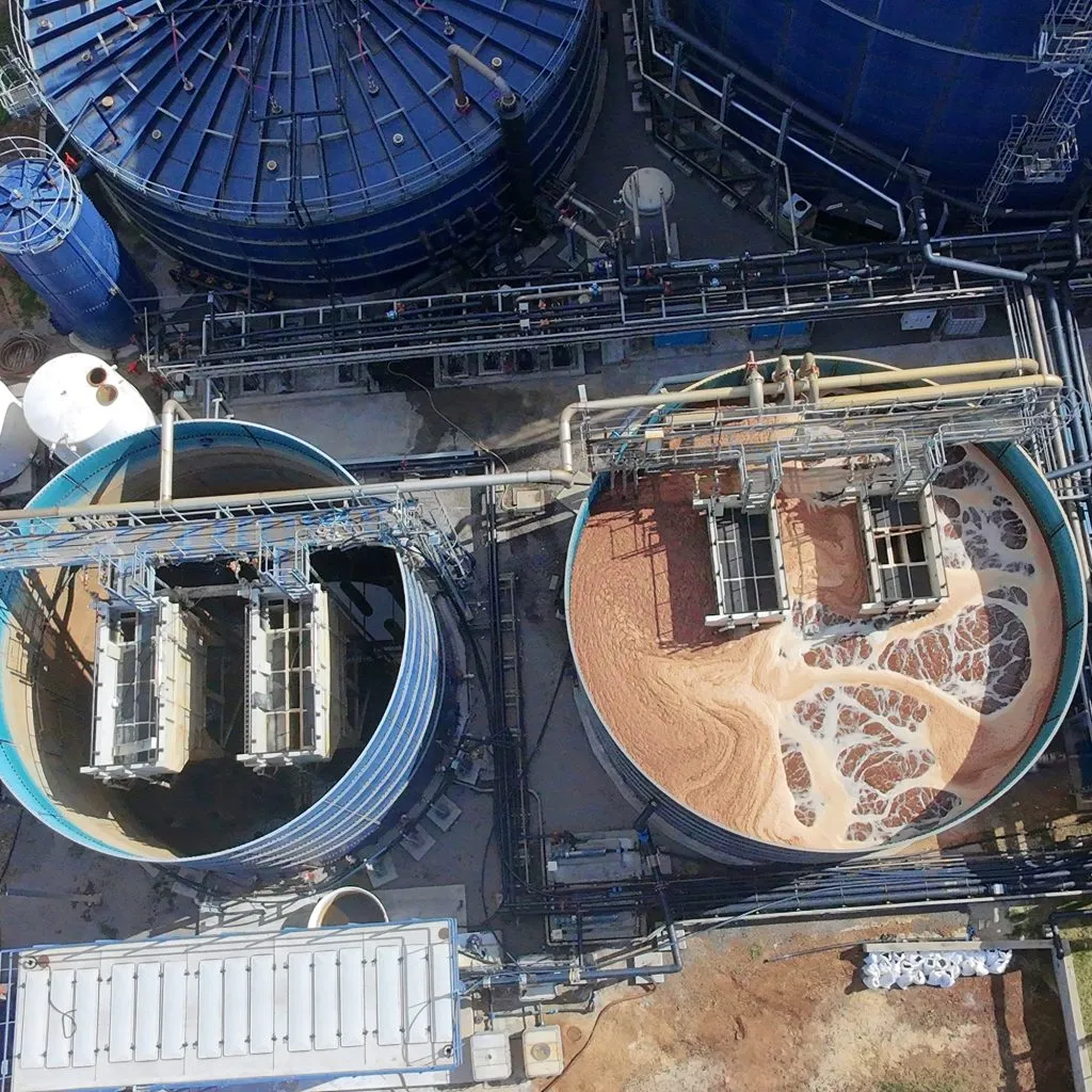 Aerial view of industrial wastewater treatment tanks